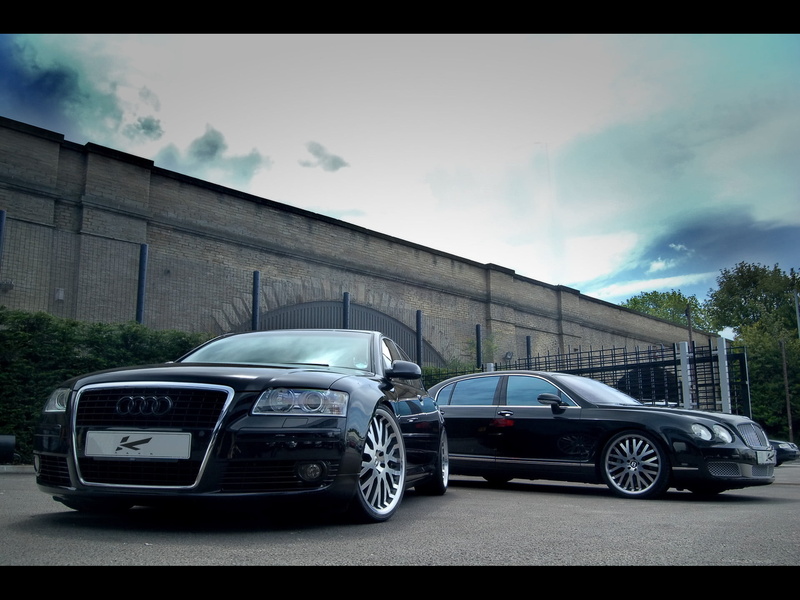 stationary, outdoors, mode of transportation, garage, motor vehicle, road, luxury, day, Cars, no people, land vehicle, 1080P, car, cloud - sky, architecture