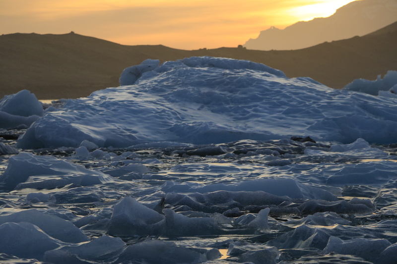 sky, floating on water, cold temperature, nature, mountain, iceberg, mountain peak, landscape, mountain range, ice, snowcapped mountain, beauty in nature