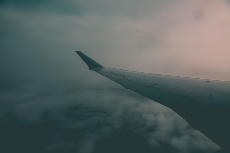public transportation, low angle view, travel, 5K, day, mode of transportation, outdoors, cloud - sky, sky, plane, cloudscape, aircraft wing, meteorology