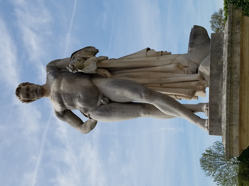 memorial, outdoors, human representation, airplane, sphere, human, creativity, no people, representation, nature, low angle view, tarmac, sky, male likeness