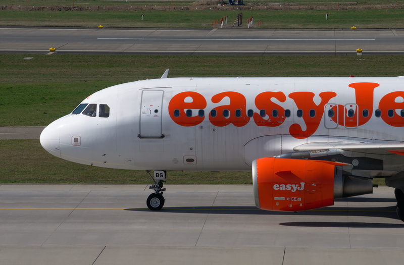 text, airport runway, A319, sign, stationary, Aircraft, no people, airplane, mode of transportation, airbus, aerospace industry, public transportation