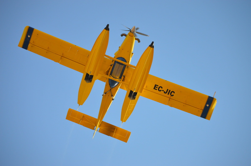 outdoors, biplane, aircraft, plane, motion, yellow, clear sky, mode of transportation, day, air vehicle, military aircraft, leaving, low angle view, airshow