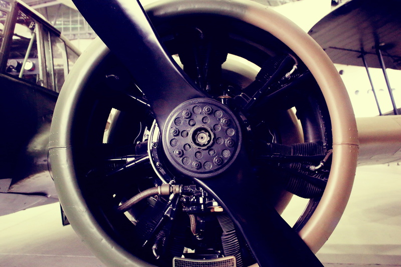 cockpit, luxury, stationary, outdoors, vehicle interior, engine, white, aerospace industry, indoors, wheel, day, close-up, monoplane, machinery, mode of transportation