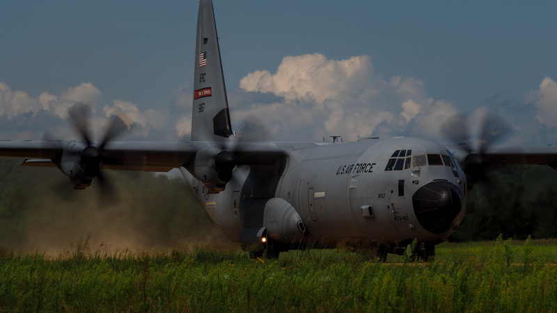 air vehicle, army, outdoors, armed forces, air, landing, sky, aircraft, flying, transport, mode of transportation, aviation, cloud - sky, airplane, c-130