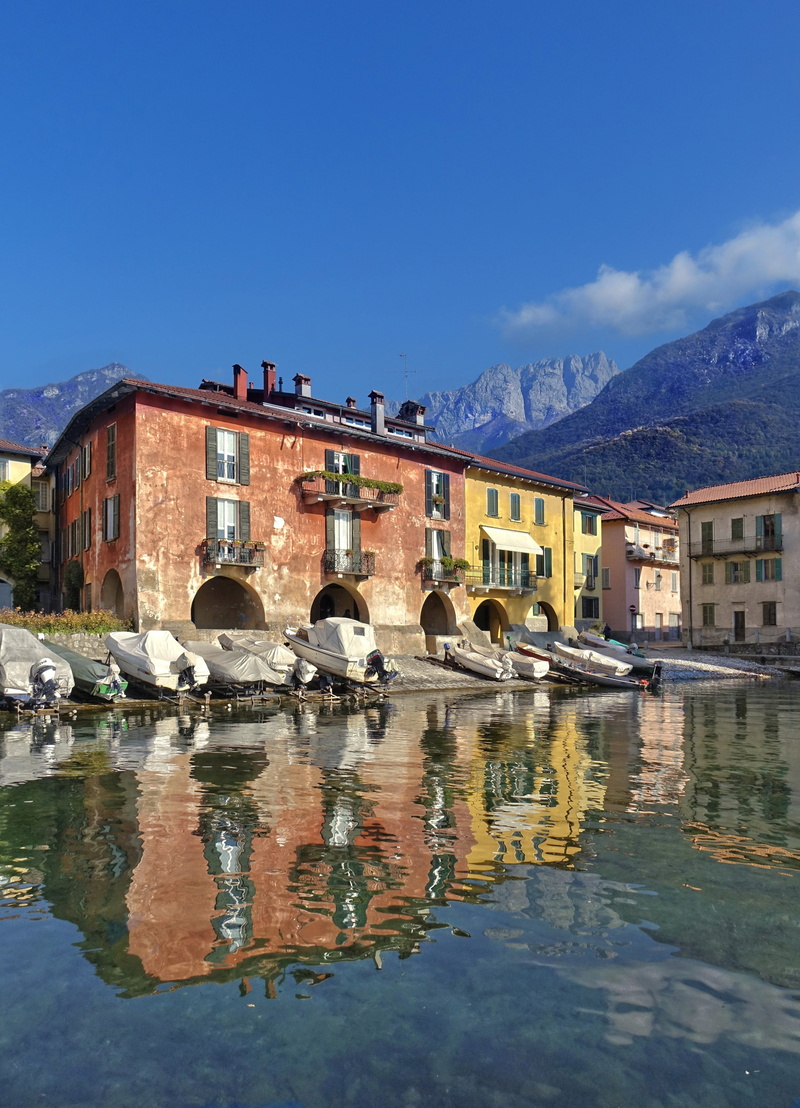built structure, outdoors, water, transportation, landscape, city, mandello, italy, nature, building, lake como, day, architecture, reflection, sky, residential district