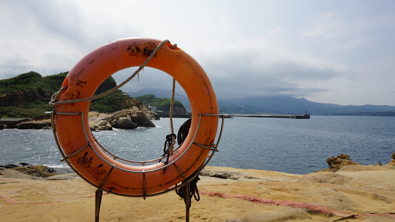 geometric shape, shape, tube, sky, nature, inflatable, security, circle, no people, sea, land, orange color, water, scenery, day, beach, rope, protection