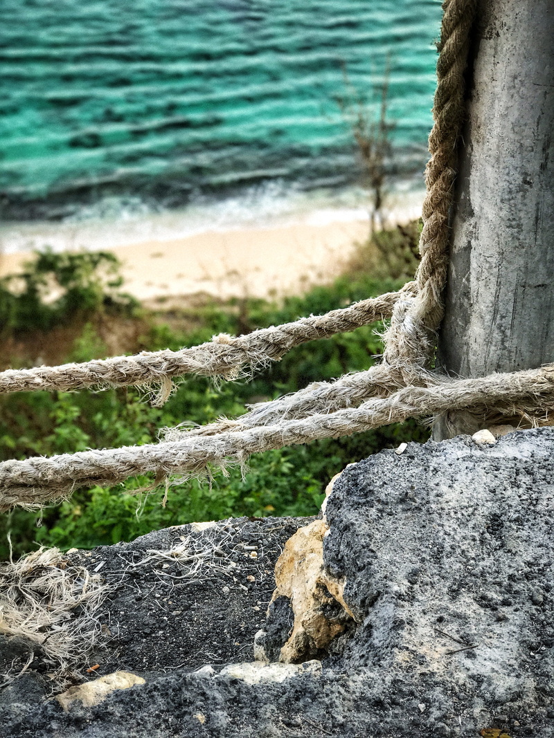 tree, trunk, closeup, plant, sand, waves, beauty in nature, focus on foreground, rock, sea, no people, outdoors, land, melasti, pantai, rope, tree trunk