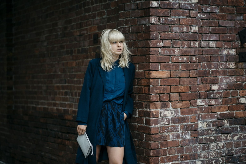 built structure, wall, adult, brick wall, brick, fashion, wall - building feature, beautiful woman, real people, standing, young adult, blond hair, Lisa Dengler