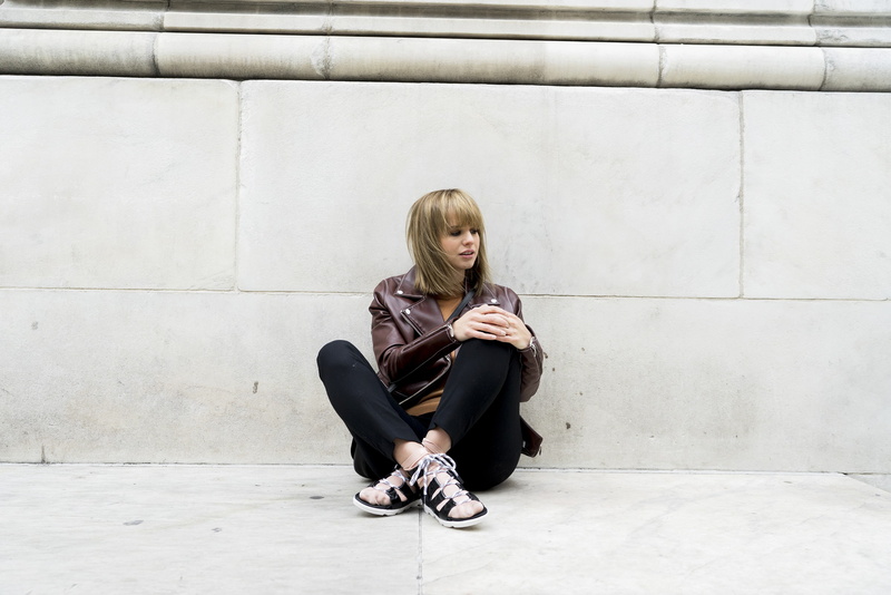 sitting, hairstyle, hair, 2K, full length, architecture, blonde, long hair, concrete, women, fashion, teenager, adult, adolescence, lifestyles, front view