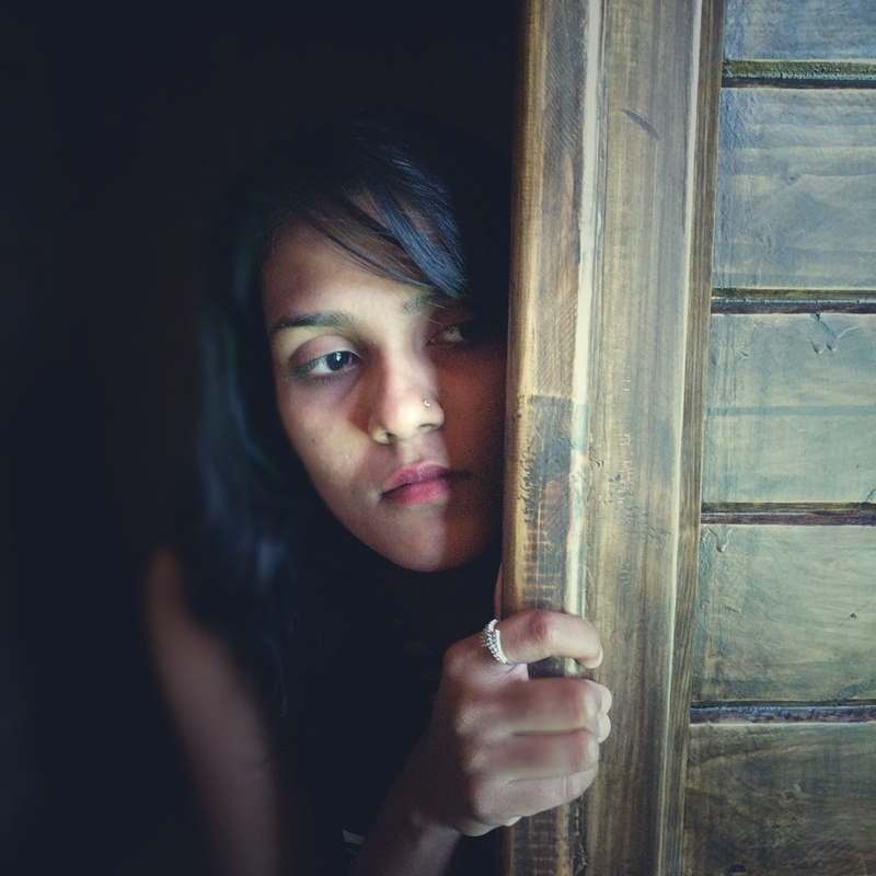 1080P, one person, girl, young adult, cute, adult, looking, indoors, mumbai, door, looking at camera, real people, hiding, front view, holding, india