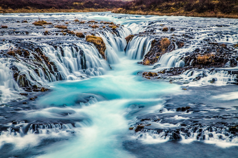beauty in nature, blurred motion, river, rock, cold temperature, power in nature, outdoors, Bruarfoss, scenics - nature, nature, environment, land, flowing