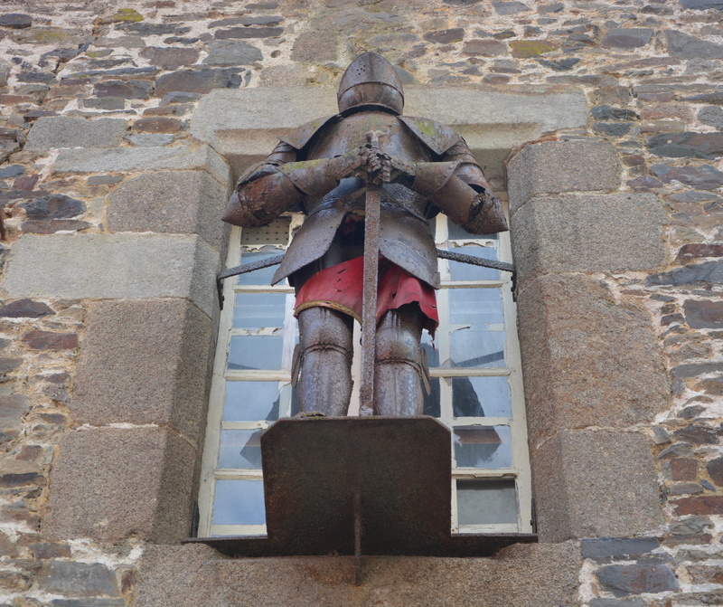 building exterior, human representation, weapon, day, sword, art and craft, middle ages, wall, old, knight, wall - building feature, the past, stone wall