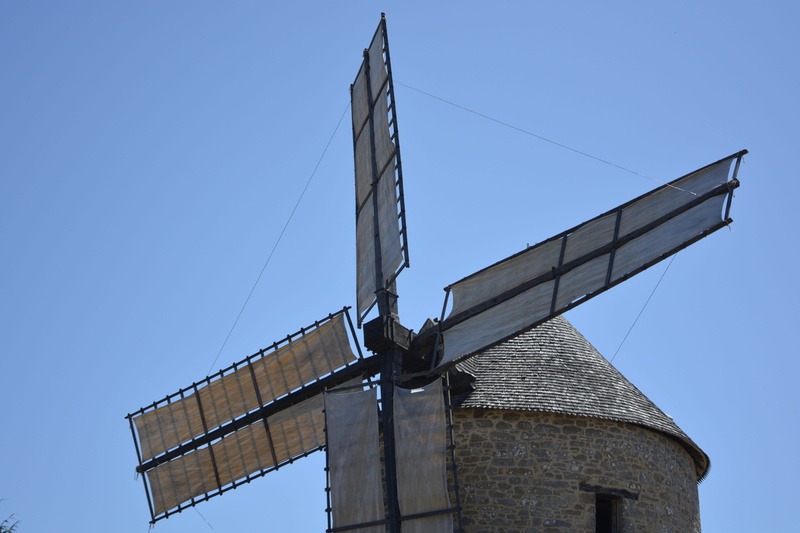 authentic, low angle view, outdoors, mill mont dol, copy space, mill, wind power, blue, turbine, architecture, sky, building exterior, alternative energy