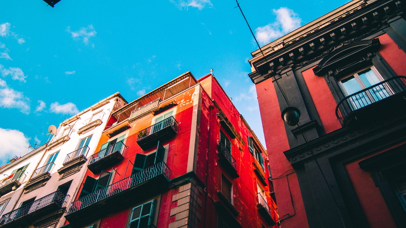 red, outdoors, archi, color, sky, window, low angle view, architecture, summer, old, city gate, city, building, day, built structure, balcony, colour, residential district