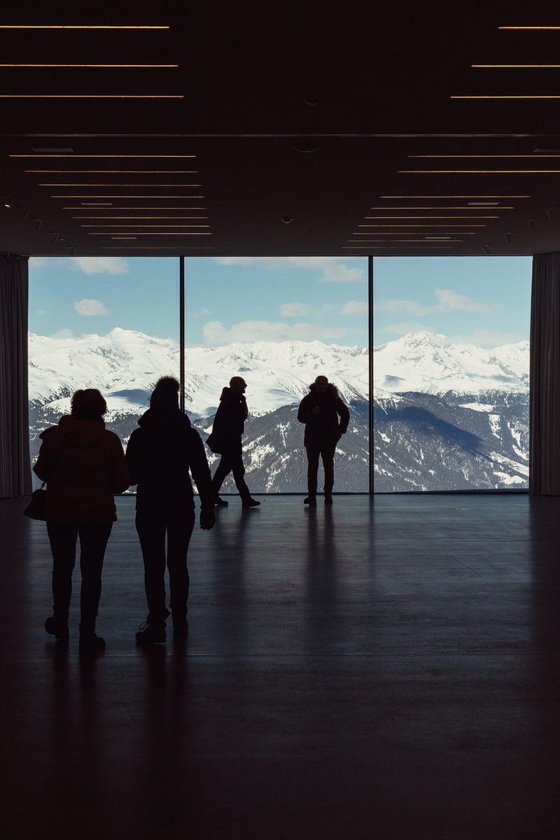 mountain, adult, silhouette, human, day, banister, room, indoors, housing, floor, standing, 4K, architecture, looking, real people, handrail, sky, women