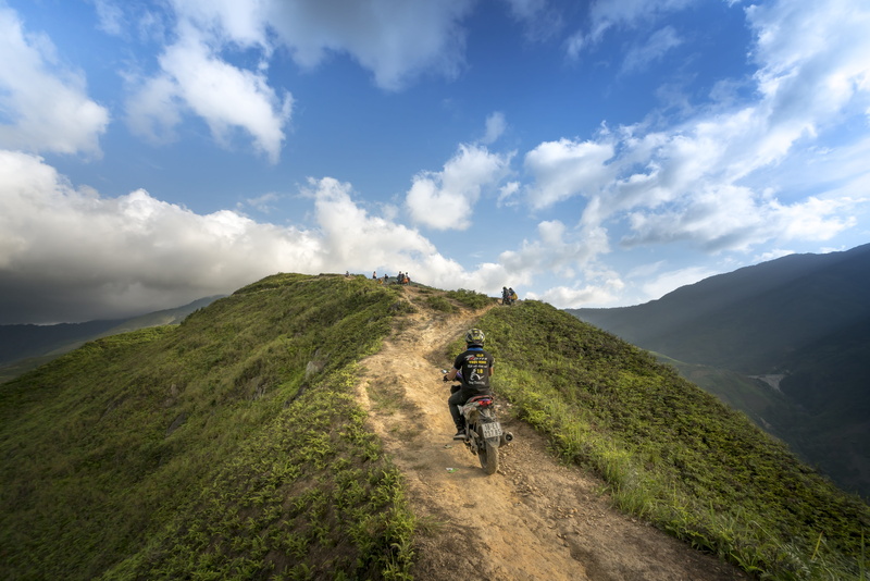 men, mountain peak, motorcycle, leisure activity, lifestyles, valley, hill, scenic, nature, mountain, summer, action, rear view, clouds, cloud - sky, motorcyclist