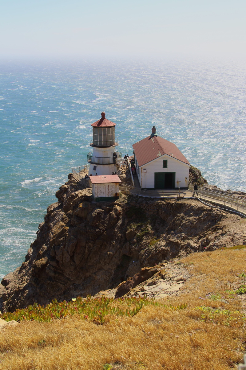 lighthouse, beauty in nature, building, rock, building exterior, sky, architecture, rock - object, land, scenics - nature, sea, nature, tranquility, no people