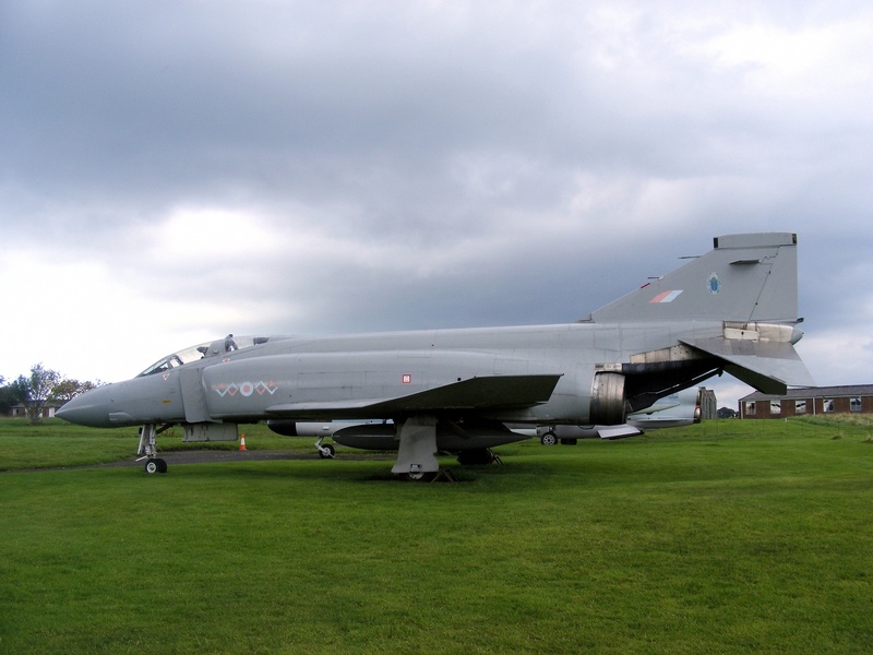 green color, aerospace, airplane, transportation, warfare, ground, defence, environment, bombs, airport, weapons, grass, travel, no people, 2K, jet, gray