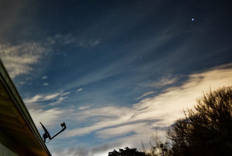 space, beauty in nature, clouds, half moon bay, bay area, outdoors, 5K, stars, night photography, tree, built structure, night sky, no people, low angle view