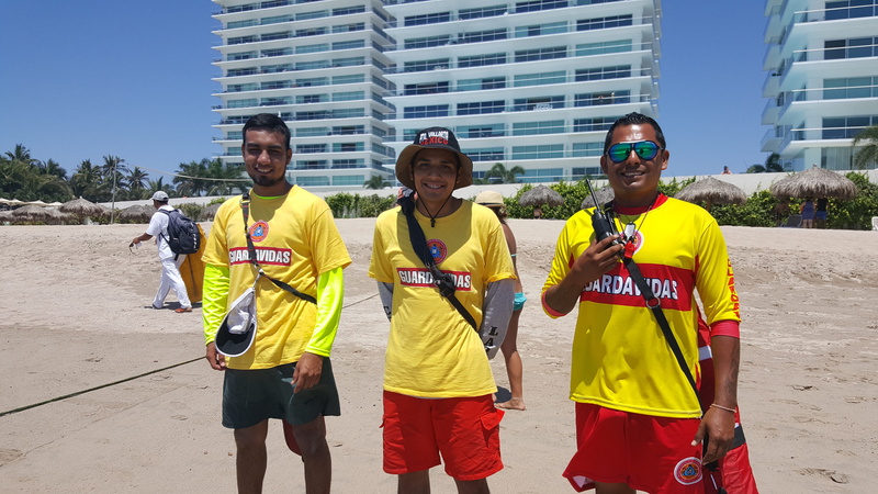 mid adult men, sunlight, group of people, puerta vallarta mexico, looking at camera, Puerta, yellow, building exterior, city, only men, architecture, portrait