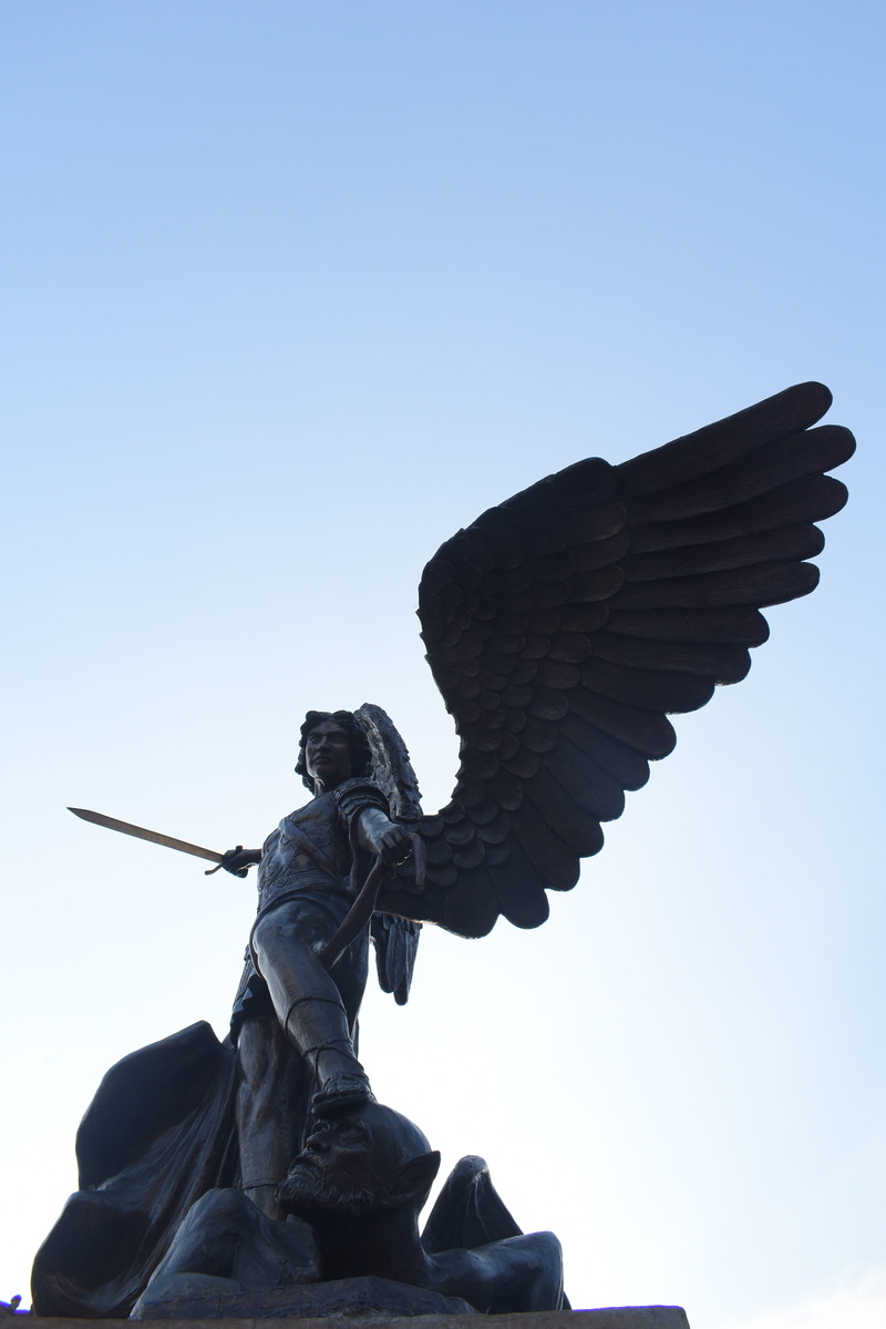 sky, sculpture, stone, museum, statue, art, low angle view, symbol, representation, blue, outdoors, tourism, no people, creativity, cathedral, male likeness