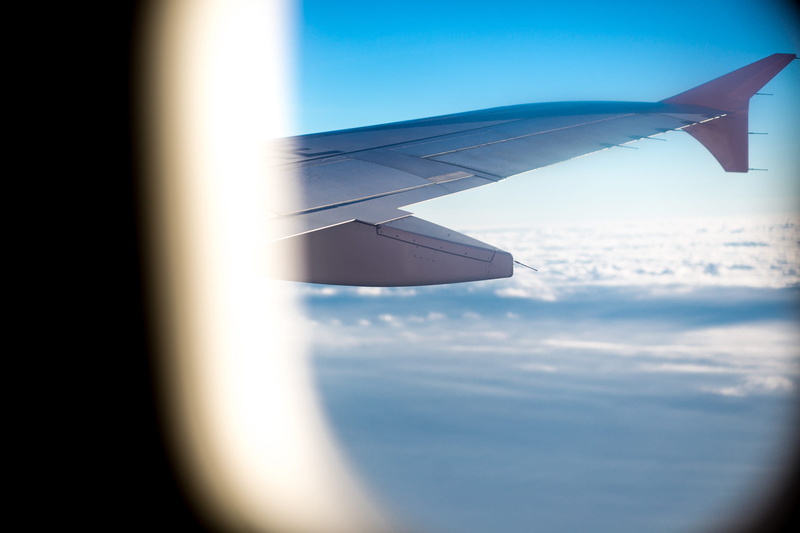 window, cloud - sky, no people, aerial view, aerospace industry, flying, aircraft, mid-air, air vehicle, aircraft wing, airplane, blue, travel, on the move