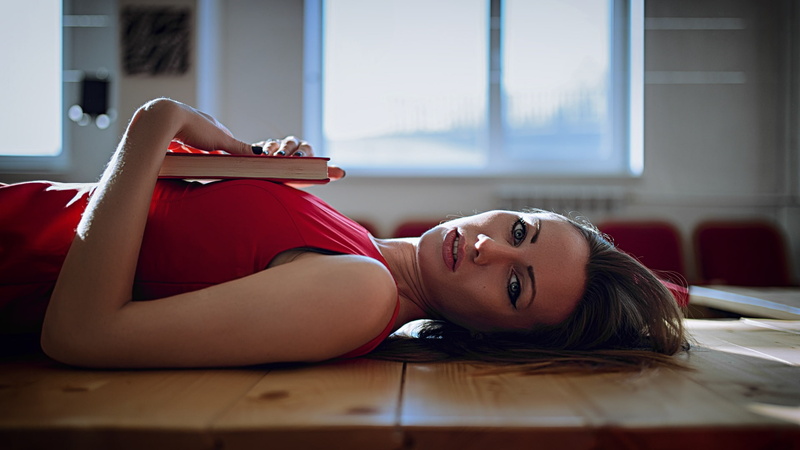 books, beautiful people, beauty, domestic room, indoors, happiness, women, adult, looking at camera, young adult, lying down, young women, model, red, one person