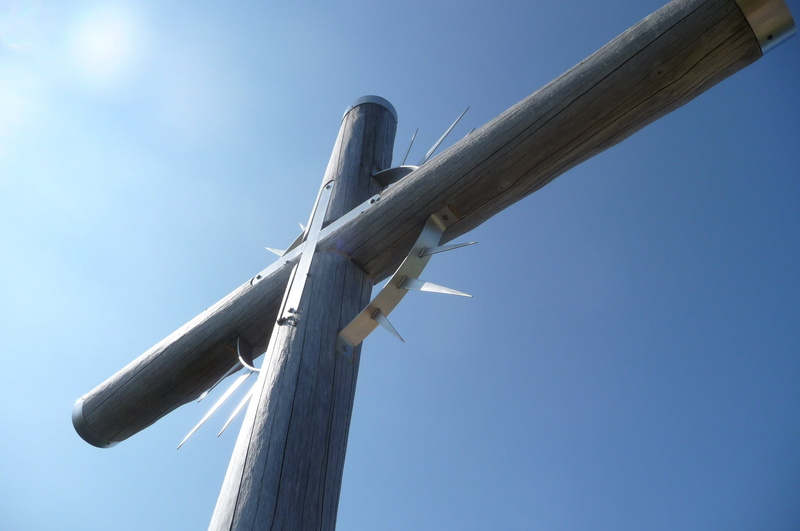 air vehicle, low angle view, summit cross, airplane, sailboat, mode of transportation, directly below, mountain summit, cross, fuel and power generation