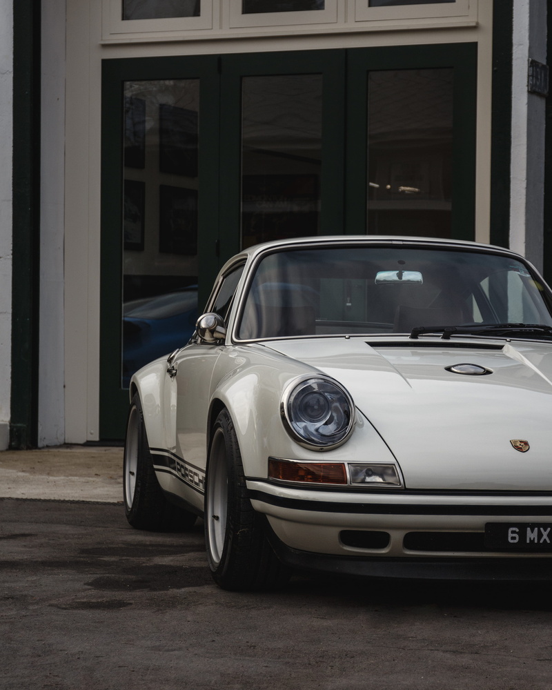 classic porsche, car, light, machine, architecture, street, car wheel, city, vintage car, windshield, vehicle, stationary, outdoors, retro styled
