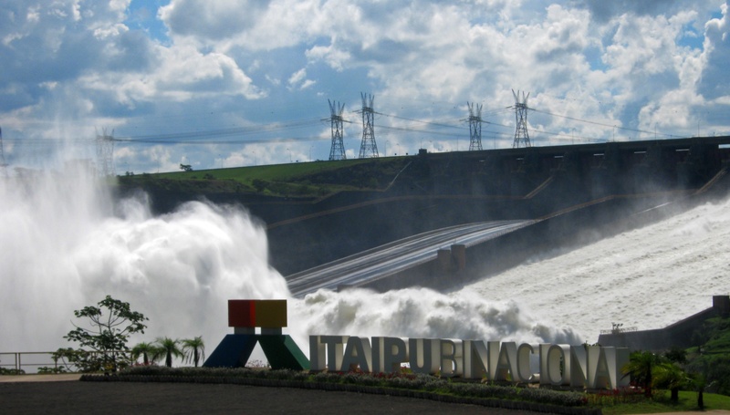 environmental conservation, wind turbine, itaipu, turbine, motion, spraying, power in nature, cloud - sky, alternative energy, sustainability, water, spillway