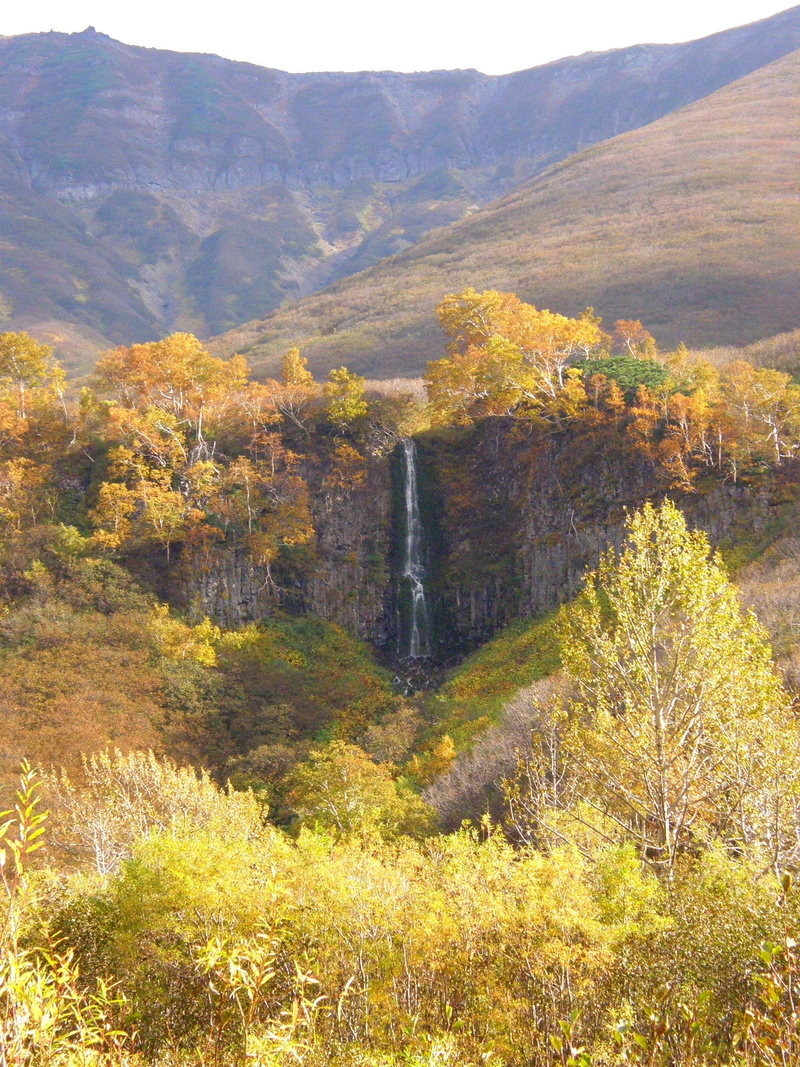 mountain, highlands, tourism, water, autumn, tranquil scene, mountain valley, landscape, growth, fall colors, no people, land, change, height, plant, flowing water