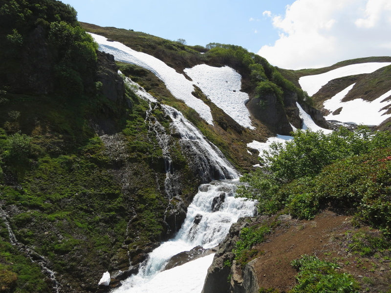 height, waterfall, rock - object, stones, rock formation, formation, sky, highlands, mountain valley, low angle view, beauty in nature, tranquility, spillway