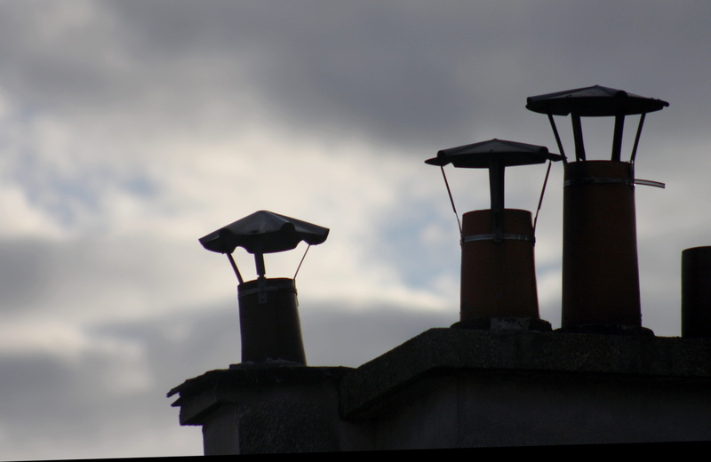 outdoors, roof, dusk, day, building exterior, night, silhouette, low angle view, tower, building, no people, architecture, sky, cloudy, nature, smokestack