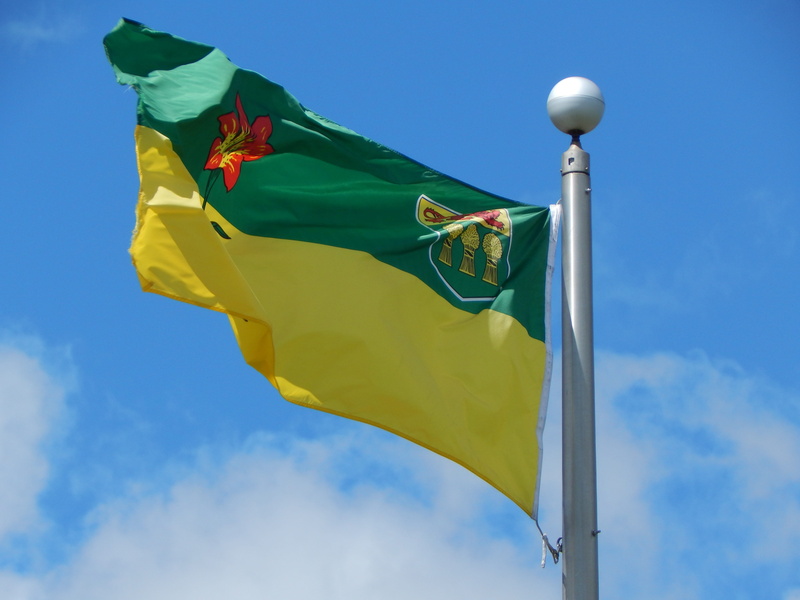 cloud - sky, saskatchewanian, canadian, multi colored, low angle view, pole, Prairies, green color, emblem, Saskatchewan, blue, sky, yellow, provincial