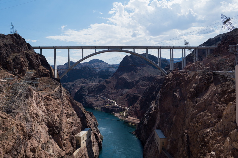 arch bridge, transportation, rock, bridge, valley, hoover, river, arch, cloud - sky, water, day, engineering, built structure, nature, cloudy, solid, bridge - man made structure