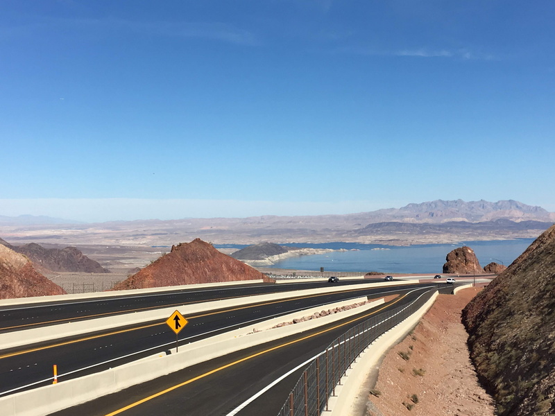 mode of transportation, beauty in nature, blue sky, colorado river, nature, water, mountain range, mountain, scenics - nature, reservoir, road, mountains