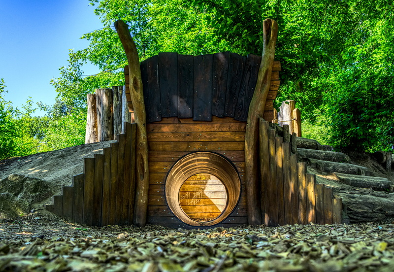 building, tunnel, romp, park, fight, tree trunk, 5K, nature, blue, architecture, wheel, play, battle arena, old, input, log, wood, tire, outdoors, forest
