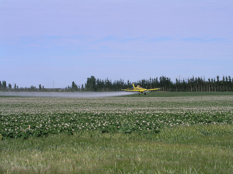 no people, outdoors, equipment, beauty in nature, tranquility, field, scenics - nature, insecticide, agriculture, plantation, nature, farm, land, chemical