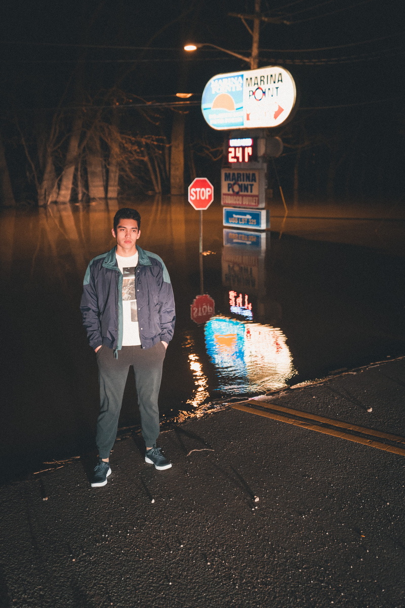 lifestyles, boat, flood, man, transportation, communication, night, illuminated, person, united states, looking at camera, button, jacket, city, moody