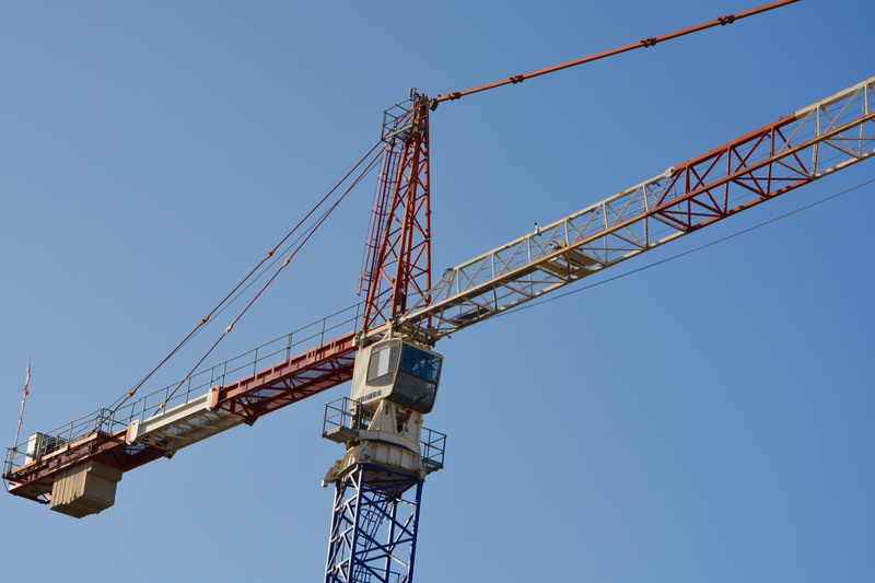 construction equipment, business, crane - construction machinery, crane, work, outdoors, nature, construction machinery, day, sky, built structure, low angle view
