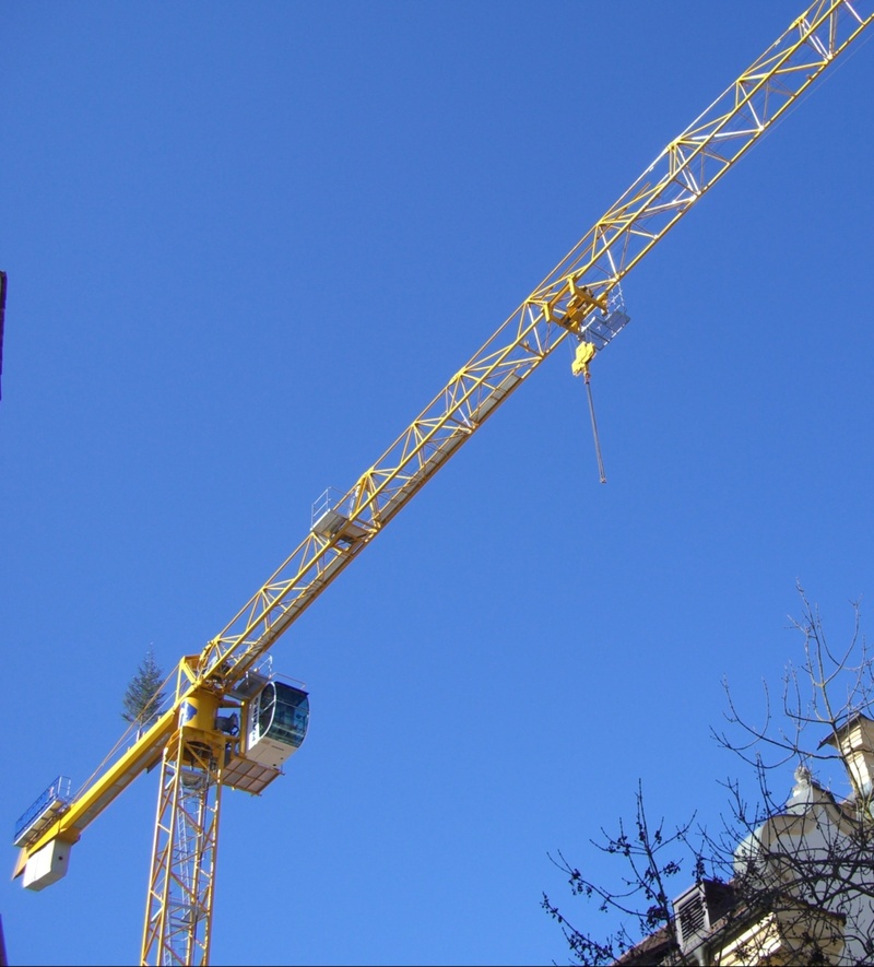 machinery, industry, copy space, low angle view, construction equipment, blue, sky, metal, development, day, crane arm, nature, construction site, outdoors