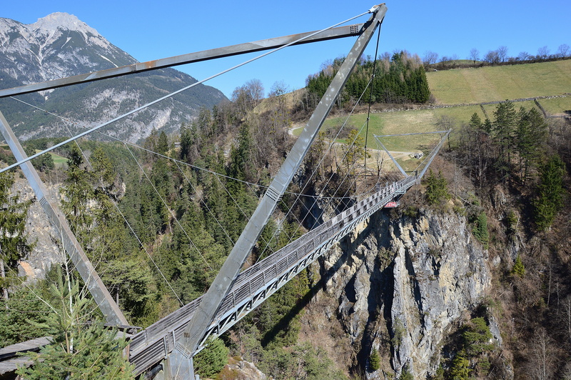 tranquil scene, bungee jumping, environment, built structure, plant, remote, nature, sky, mountain, tyrol, 5K, benni raich bridge, land, height, no people