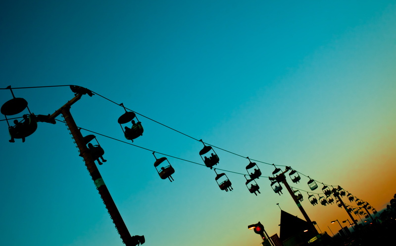 in a row, outdoors, day, no people, Santa Cruz Boardwalk, cable, bunting, sky, blue, Santa Cruz County, santa, California, Ride, hanging, electricity, Santa Cruz