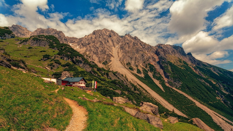 building, nature, architecture, house, sky, unpaved pathway, daylight, green, idyllic, beauty in nature, building exterior, tranquil scene, rocks, built structure
