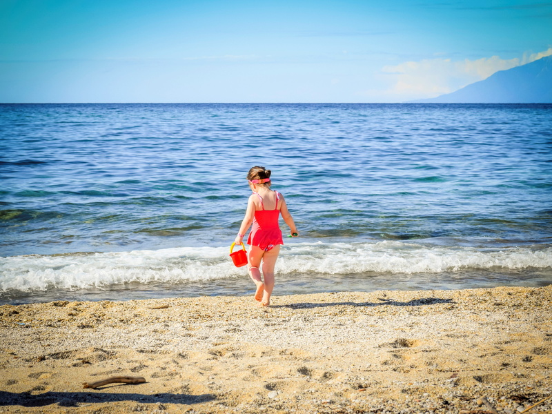 one person, beach, beauty in nature, water, child, seafoam, 5K, girl, scenic, young adult, playing, cute, tranquil, sand, full length, scenics - nature