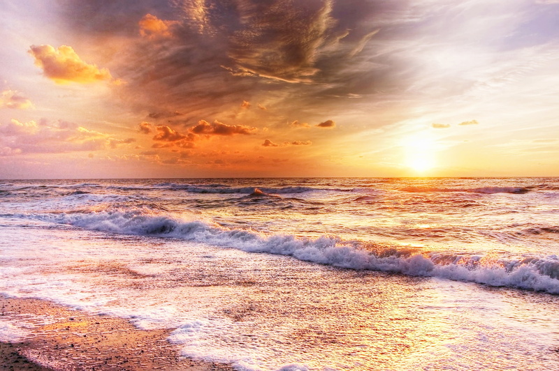 scenics - nature, horizon, motion, land, tranquility, aquatic sport, seafoam, clouds, sun, golden hour, sky, waves, dramatic, cloud - sky, dusk, sport