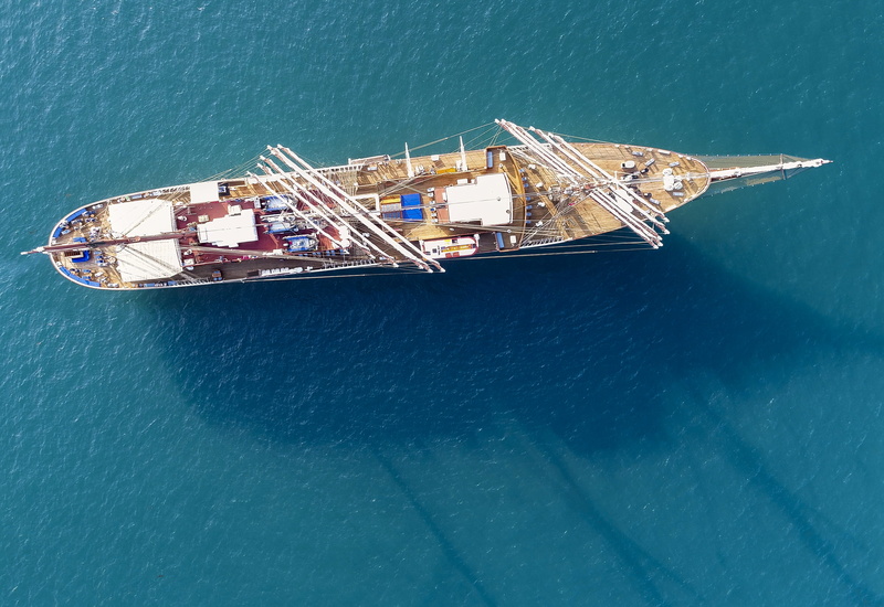 cargo ship, aerial, day, mode of transportation, high angle view, no people, fossil fuel, drilling rig, industry, outdoors, oil, brown, nautical vessel