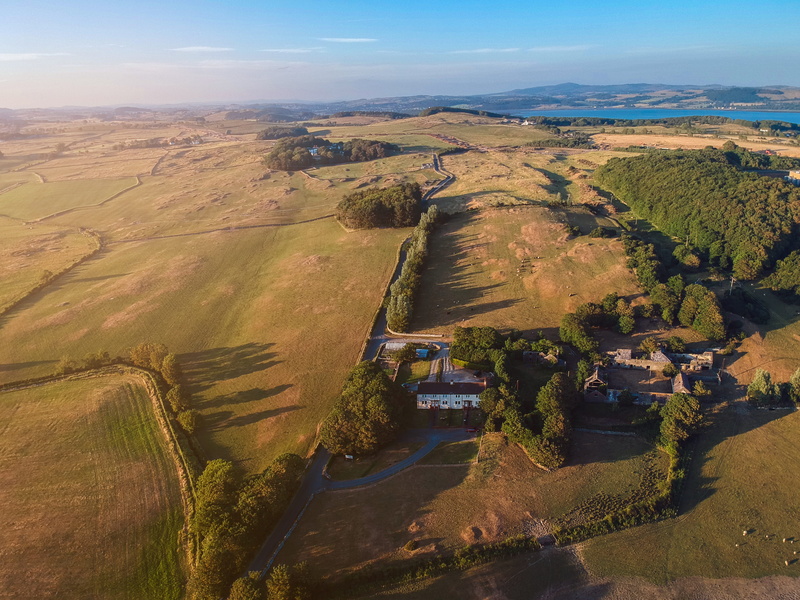 beauty in nature, field, dji, tranquility, green color, landscape, land, dji spark, sunset, sea, adventure, day, plant, tranquil scene, brighouse bay holiday cottages