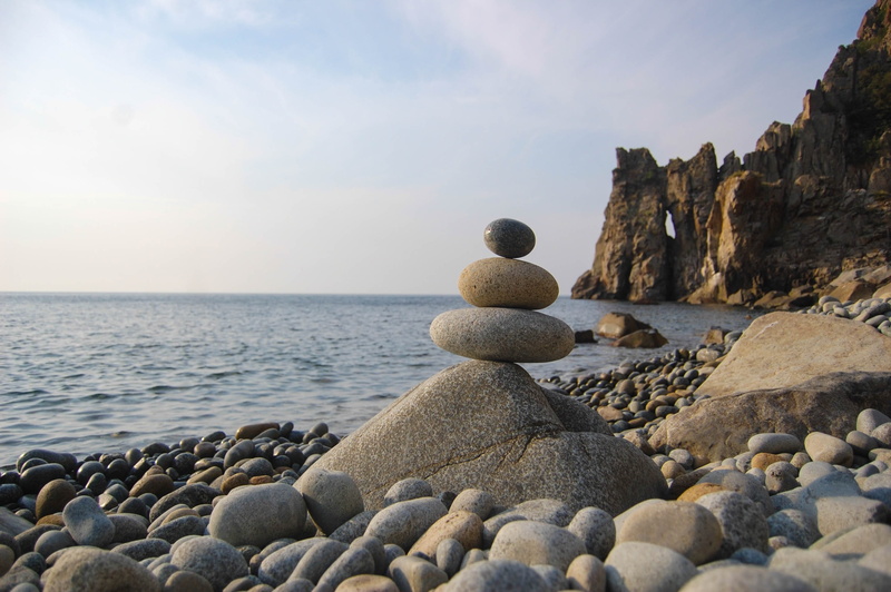 beauty in nature, land, tranquil scene, pebbles, rock, bay, nature, stone - object, solid, rock - object, no people, sea, sky, pebble, idyllic, scenics - nature