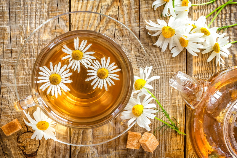 table, directly above, indoors, chamomile, food and drink, pitcher - jug, petal, beauty in nature, tea - Hot Drink, close-up, honey, leaf, glass, plant